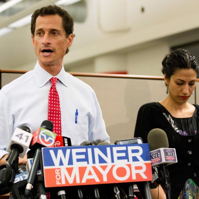 New York mayoral candidate Anthony Weiner speaks during a news conference alongside his wife Huma Abedin at the Gay Men's Health Crisis headquarters, Tuesday, July 23, 2013, in New York. The former congressman says he's not dropping out of the New York City mayoral race in light of newly revealed explicit online correspondence with a young woman. 