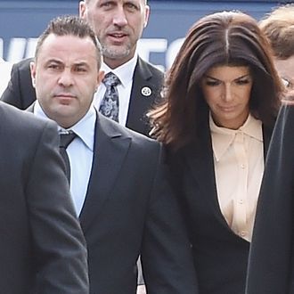 NEWARK, NJ - OCTOBER 02: Joe Giudice (2nd from L) and wife Teresa Giudice arrive for sentencing at federal court in Newark on October 2, 2014 in Newark, New Jersey. (Photo by Mike Coppola/Getty Images)