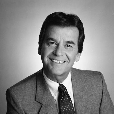 Headshot studio portrait of American television host, producer, and actor Dick Clark, dressed in a blazer and tie, February 25, 1985.