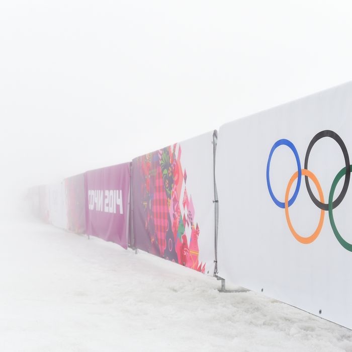 SOCHI, RUSSIA - FEBRUARY 17: A general view of barriers displaying the Olympic rings in fog during day ten of the Sochi 2014 Winter Olympics at Laura Cross-country Ski & Biathlon Center on February 17, 2014 in Sochi, Russia. (Photo by Harry How/Getty Images)
