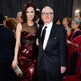 News Corp. Founder/CEO Rupert Murdoch (R) and Wendi Deng Murdoc arrive at the Oscars at Hollywood & Highland Center on February 24, 2013 in Hollywood, California. 
