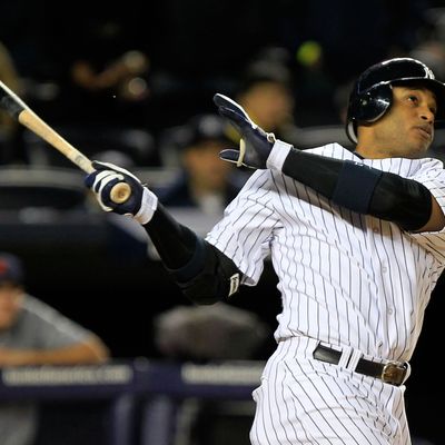  Robinson Cano #24 of the New York Yankees watches his grand slam home run in the sixth inning of Game One of the American League Division Series against the Detroit Tigers.