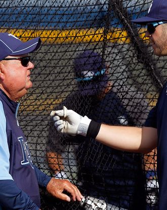 Senior baseball advisor Don Zimmer (left) talks with Evan Longoria #3 of the Tampa Bay Rays