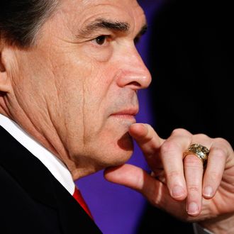 HANOVER, NH - OCTOBER 11: Republican presidential candidate and incumbent Texas Gov. Rick Perry prepares for a presidential debate hosted by Bloomberg and the Washington Post on October 11, 2011 at Dartmouth College in Hanover, New Hampshire. The event moderated by U.S. television talk show host Charlie Rose and featuring eight Republican candidates, presents the first debate of the 2012 political season focused solely on the economy. (Photo by Scott Eells-Pool/Getty Images)