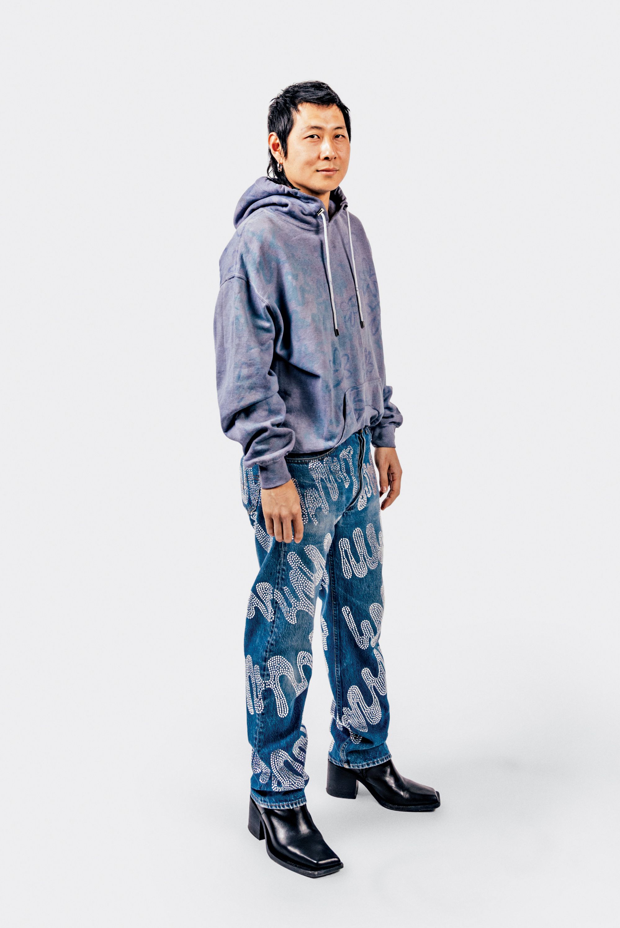 <p><strong>Danny Bowien</strong></p><p><em>Chef, Lower East Side</em></p><p><br /></p><p><strong>Why are you here? </strong></p><p>My girlfriend’s in the show. I’m just tagging along. I actually walked one year for Collina Strada, the year Hayley Williams from Paramore was performing. This year, I’m just in the audience eating—they gave out those little Nestlé chocolate-covered ice-cream balls.</p>