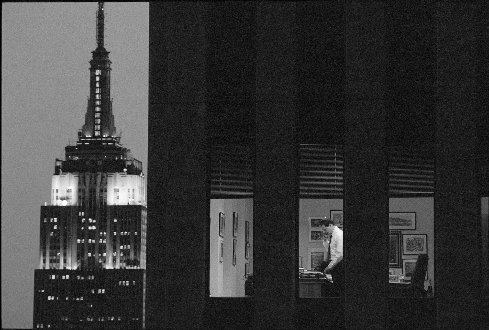 Night scene with a man in front of a vampire manor