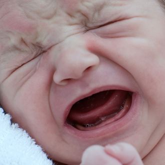 Newborn boy crying