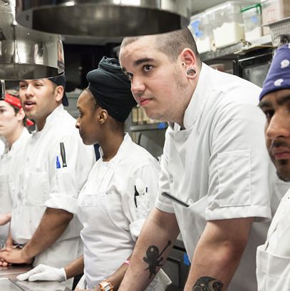 The crew at Nellcôte lined up for plating.