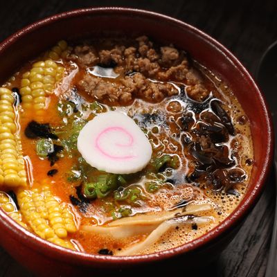 Spicy miso: red miso-and-pork-based soup topped with scallion, ground pork, menma, corn, sesame, and chili oil.