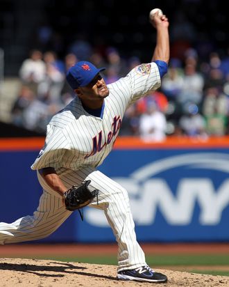 Johan Santana #57 of the New York Mets throws a pitch against the Atlanta Braves during their Opening Day Game at Citi Field on April 5, 2012 in New York City. 