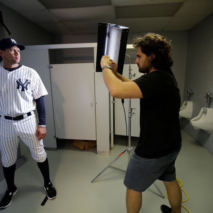 New York Yankees' Alex Rodriguez, left, poses for photographer Nick Laham on photo day