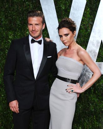 WEST HOLLYWOOD, CA - FEBRUARY 26: Athlete David Beckham (L) and entertainer Victoria Beckham arrives at the 2012 Vanity Fair Oscar Party hosted by Graydon Carter at Sunset Tower on February 26, 2012 in West Hollywood, California. (Photo by Alberto E. Rodriguez/Getty Images)