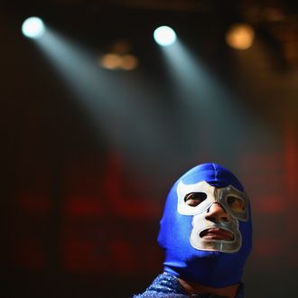LONDON - JULY 03: Mexican Lucha Libre wrestler El Hijo del Santo (the greatest living Luchador and heir of the Silver Legend) looks on before performing for media during a press call on July 3, 2008 in London, England. The Lucha Libre, authentic Mexican free wrestling featuring men in mysterious, colourful and elaborate masks, are due to perform this weekend at the Roundhouse Theatre in London. (Photo by Daniel Berehulak/Getty Images)