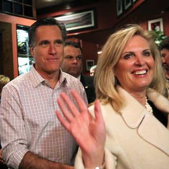 CINCINNATI, OH - MARCH 03: Republican presidential candidate, former Massachusetts Gov. Mitt Romney and his wife Ann Romney walk through The Montgomery Inn Restaurant at the Roadhouse on March 3, 2012 in Cincinnati, Ohio. Mitt Romney is campaigning in Ohio ahead of Super Tuesday. (Photo by Justin Sullivan/Getty Images)