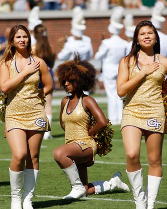 NFL cheerleader takes a knee during national anthem, News