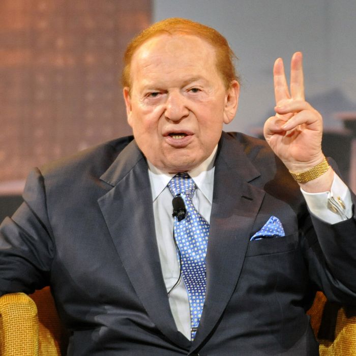 US gaming tycoon Sheldon Adelson gestures during a press conference at the Marina Bay Sands complex in Singapore on June 23, 2010. 