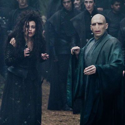 Voldemort (Ralph Fiennes) asks to check if Harry is dead. Lucius Malfoy - Jason Isaacs, Bellatrix Lestrange - Helena Bonham Carter. The Forbidden Forest. (SC334)