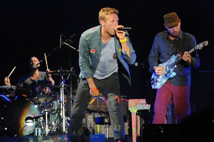 ATLANTA, GA - SEPTEMBER 24:  Will Champion, Chris Martin and Jonny Buckland of Coldplay perform at Piedmont Park on September 24, 2011 in Atlanta, Georgia.  (Photo by Chris McKay/WireImage)