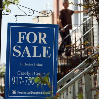 NEW YORK - JULY 28: A home stands for sale on July 28, 2009 in the Brooklyn borough of New York City. The Commerce Department announced July 27, that new-home sales surged in June from the previous month, the third straight increase in a row. Sales of single-family homes increased by 11.0% to a seasonally adjusted annual rate of 384,000 compared to the prior month. (Photo by Spencer Platt/Getty Images)