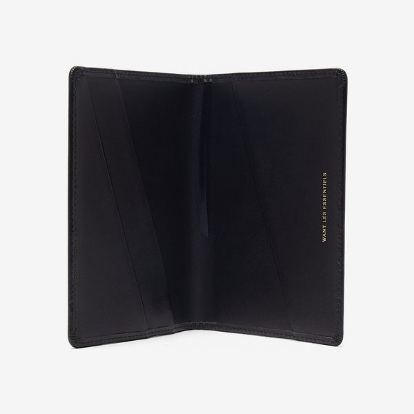 Want Les Essentiels Pearson Leather Passport Holder thin black leather bi-fold passport holder with a minimalist Want Les Essentials logo embossed in gold. The Strategist - 48 Things on Sale You’ll Actually Want to Buy: From Sunday Riley to Patagonia