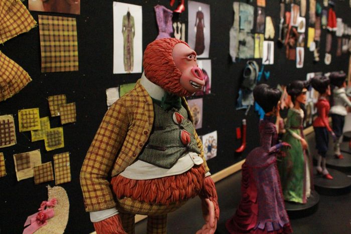Mr. Link at the LAIKA studio next to fabric samples and other stop-motion puppets.