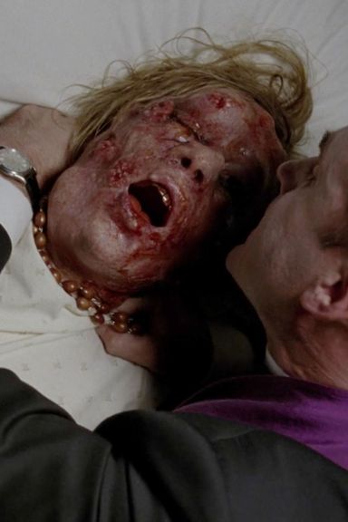 After having both her legs amputated, her skin mutilated, and being injected with unknown pathogens, Shelly (Chloe Sevigny) is choked to death with a rosary by Monsignor Howard (Joseph Fiennes).