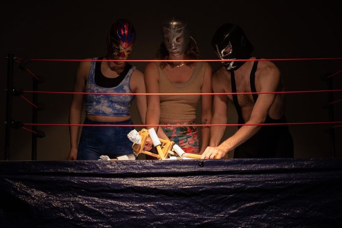 The puppet landing in the middle of the ring at the top of show. Puppeteers (from L) Madeleine Dauer, Emma Wiseman, and Rowan Magee.