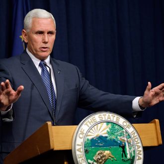 Indiana Gov. Mike Pence holds a news conference at the Statehouse in Indianapolis, Thursday, March 26, 2015. Pence has declared a public health emergency in response to the HIV epidemic in Scott County. Seventy two cases of HIV have been confirmed in the southern Indiana county. (AP Photo/Michael Conroy)