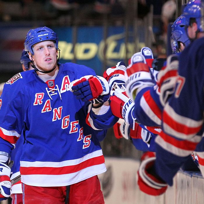 NEW YORK, NY - APRIL 17: Marc Staal #18 of the New York Rangers celebrates with teammates on the bench after Vaclav Prospal #20 scored a goal in the third period in Game Three of the Eastern Conference Quarterfinals during the 2011 NHL Stanley Cup Playoffs at Madison Square Garden on April 17, 2011 in New York City. (Photo by Bruce Bennett/Getty Images)