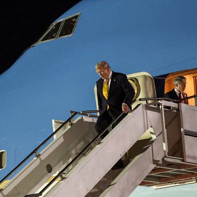 President Trump Aboard Air Force One Stops At Royal Air Force Mildenhall En Route Back From NATO Summit In Turkey