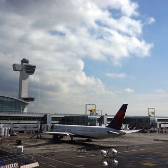 NEW YORK, NY - FEBRUARY 28: A plane waits at John F. Kennedy Airport on February 28, 2013 in New York City. Should the $85 billion in automatic federal budget cuts, known as the sequester, go into effect Friday as scheduled, airport control towers in a number of states could close, putting pilots and staff members at risk. In addition to the closed control towers, Transportation Security Administration (TSA) workers could be furloughed, leading to long waits and confusion at many airport security checkpoints. (Photo by Spencer Platt/Getty Images)