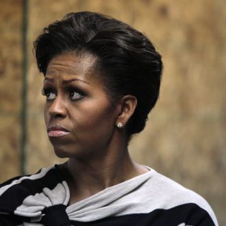 CHICAGO, IL - OCTOBER 25: First lady Michelle Obama tours Iron Street Urban Farm, one of the Growing Power farms, on October 25, 2011 in Chicago, Illinois. Earlier in the day Obama visited a Walgreens store that sells produce. The visits were part of the first lady's 