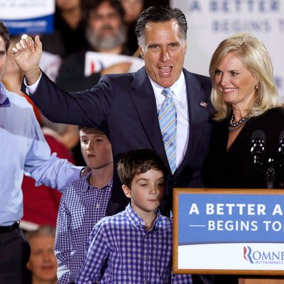 MANCHESTER, NH - APRIL 24: Republican presidential candidate, former Massachusetts Gov. Mitt Romney, his wife Ann Romney (R), his son Tagg Romney and some of his grandchildren wave to supporters during a campaign rally titled 