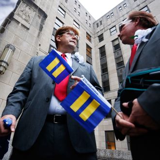 Curtis Stephens, left, and Pat Helms, who've been partners for 30 years, wait for the Jefferson County courthouse doors to open so they can be legally married, Monday, Feb. 9, 2015, in Birmingham, Ala. 