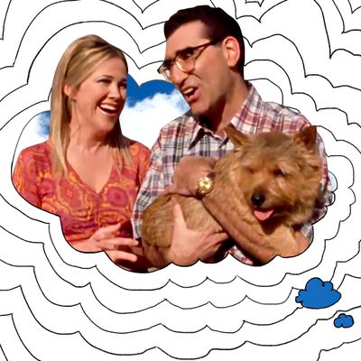 Catherine O'Hara, Eugene Levy, a Norwich Terrier.