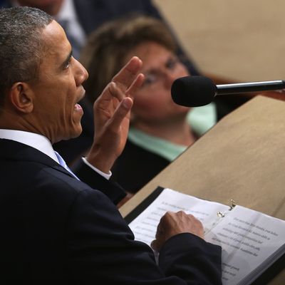 WASHINGTON, DC - JANUARY 28: U.S. President Barack Obama delivers the State of the Union address to a joint session of Congress in the House Chamber at the U.S. Capitol on January 28, 2014 in Washington, DC. In his fifth State of the Union address, Obama is expected to emphasize on healthcare, economic fairness and new initiatives designed to stimulate the U.S. economy with bipartisan cooperation. (Photo by Chip Somodevilla/Getty Images)