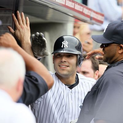 NEW YORK, NY - SEPTEMBER 05: Jesus Montero #63 of the New York Yankees celebrates his fifth-inning home run against the Baltimore Orioles on September 5, 2011 at Yankee Stadium in the Bronx borough of New York City. The home run was the first in the major leagues for Montero. (Photo by Jim McIsaac/Getty Images)