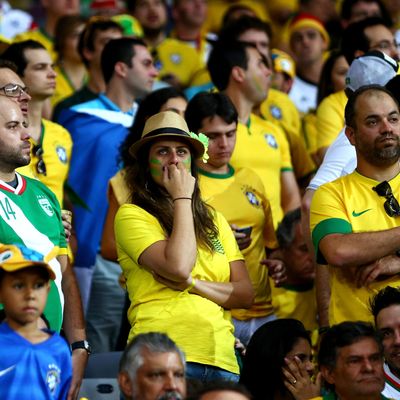 BELO HORIZONTE, BRAZIL - JULY 08: Brazil fans look dejected during the 2014 FIFA World Cup Brazil Semi Final match between Brazil and Germany at Estadio Mineirao on July 8, 2014 in Belo Horizonte, Brazil. (Photo by Michael Steele/Getty Images)