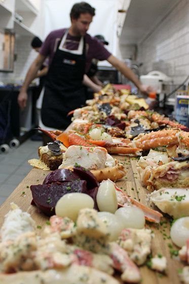 The spread included crab legs, lobster salad, smoked mussels, lox, and croque monsieur with shaved black truffle.