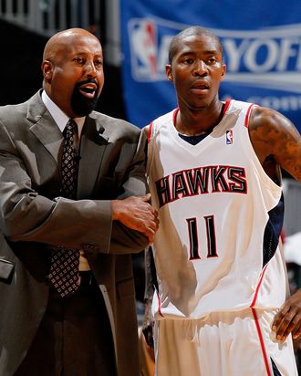 ATLANTA - MAY 10: Head coach Mike Woodson and Jamal Crawford #11 of the Atlanta Hawks against the Orlando Magic during Game Four of the Eastern Conference Semifinals of the 2010 NBA Playoffs at Philips Arena on May 10, 2010 in Atlanta, Georgia. NOTE TO USER: User expressly acknowledges and agrees that, by downloading and/or using this Photograph, User is consenting to the terms and conditions of the Getty Images License Agreement. (Photo by Kevin C. Cox/Getty Images)