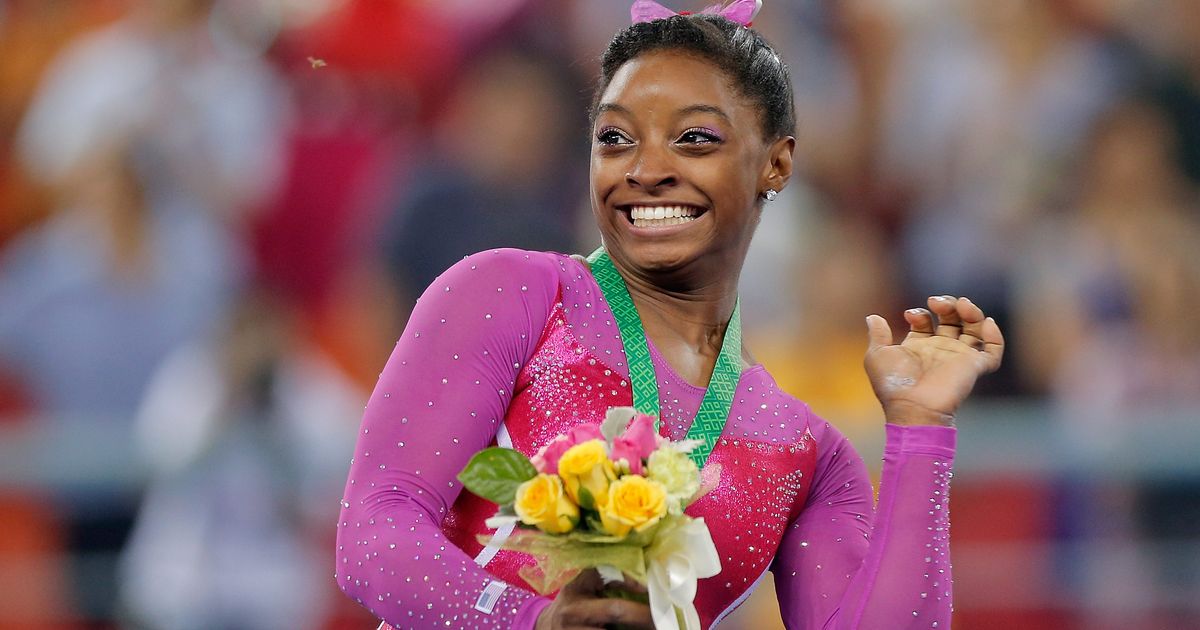 Simone Biles Chased by Bee From Bouquet at Worlds in 2014