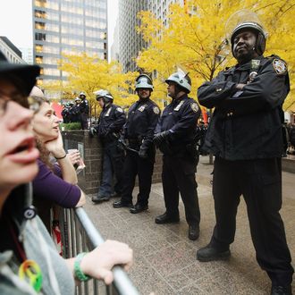 NEW YORK, NY - NOVEMBER 15: Occupy Wall Street activists protest outside Zuccotti Park after police removed the protesters early in the morning from Zuccotti Park on November 15, 2011 in New York City. Hundreds of protesters, who rallied against inequality in America, have slept in tents and under tarps since September 17 in Zuccotti Park, which has since become the epicenter of the global Occupy movement. The raid in New York City follows recent similar moves in Oakland, California, and Portland, Oregon. (Photo by Mario Tama/Getty Images)