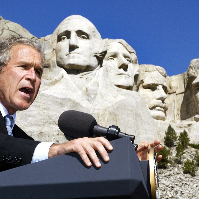 US President George W. Bush addresss a crowd at Mount Rushmore National Memorial in South Dakota, 15 August 2002. The president spoke about the budget and national security. AFP PHOTO/PAUL J. RICHARDS (Photo credit should read PAUL J. RICHARDS/AFP/Getty Images)
