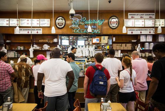 A typical scene, waiting for sandwiches.