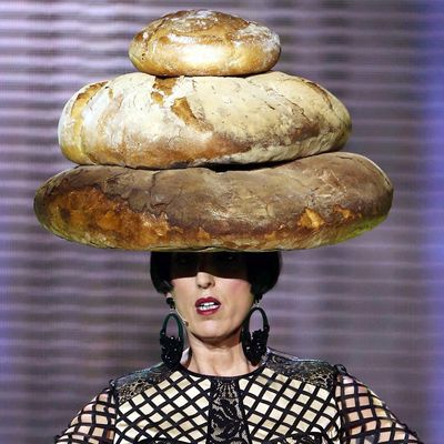 Rossy de Palma in a bread hat.
