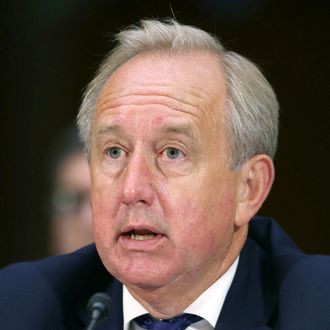 David Bagley (L), head of group compliance, HSBC Holdings plc, London, England, testifies during a Senate Homeland Security and Governmental Affairs Committee hearing