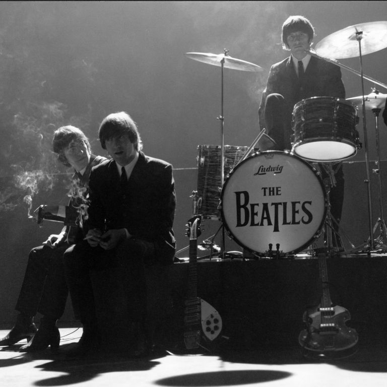 George Harrison, John Lennon, and Ringo Starr smoke on set at Granville Studio.