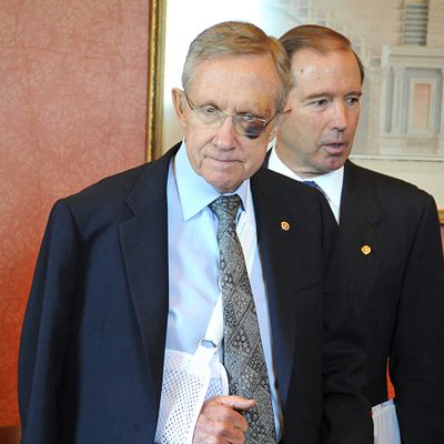 Senate Majority Leader Harry Reid , D-NV, recovering from a fall during a morning run last week, arrives with Sen. Tom Udall D-NM for a meeting with Mexico's Felipe Calderon at the US Capitol on May 11, 2011 in Washington, DC. Calderon will meet with senators Reid, Mitch McConnell, R-KY, Diane Feinstein ,D-CA, and other Congressional leaders to discuss US/Mexico relations. AFP PHOTO/Karen BLEIER (Photo credit should read KAREN BLEIER/AFP/Getty Images)