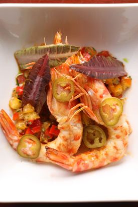 Roasted Mayan prawns with baby romaine, salsita of fresh coriander, garlic, and tomato.