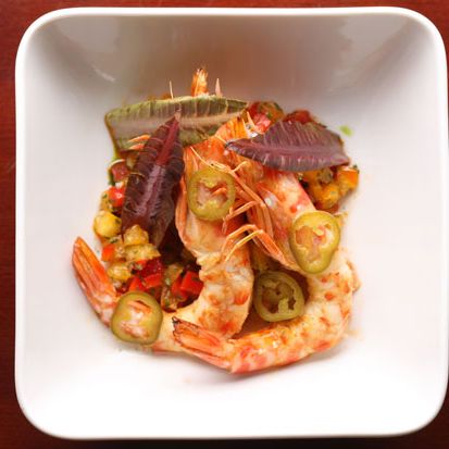 Roasted Mayan prawns with baby romaine, salsita of fresh coriander, garlic, and tomato.